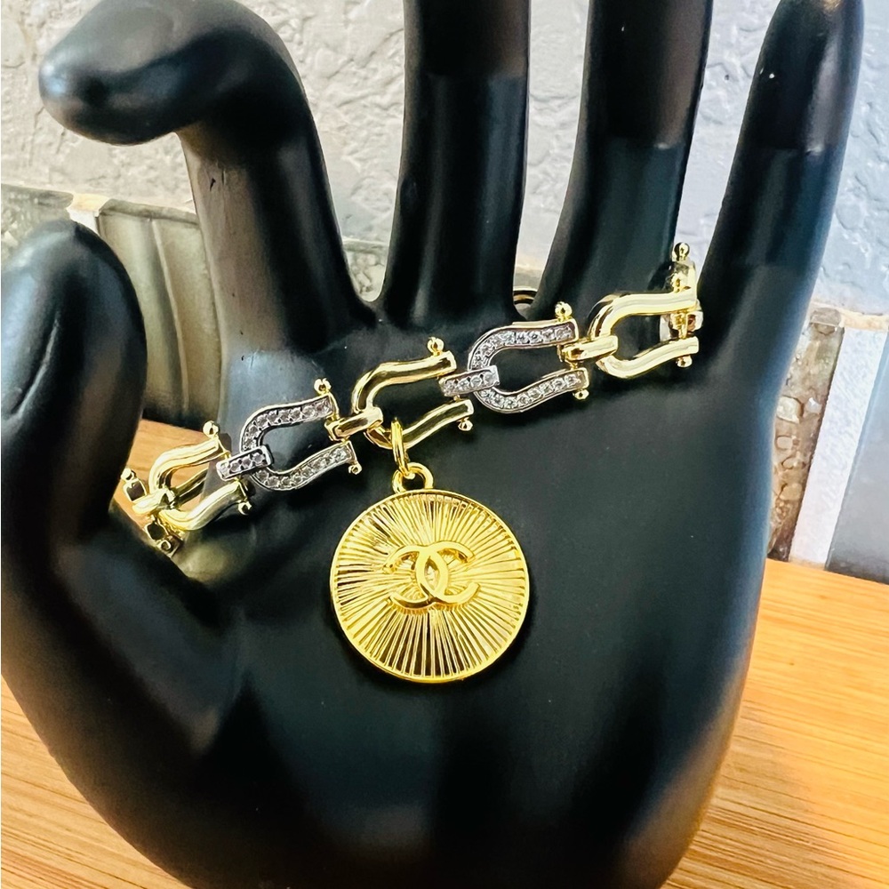 Gold and Silver Chain Bracelet with Medallion